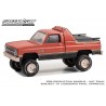 Greenlight Hobby Exclusive - 1984 Chevrolet K-10 Scottsdale 4x4 Sno Chaser Weathered